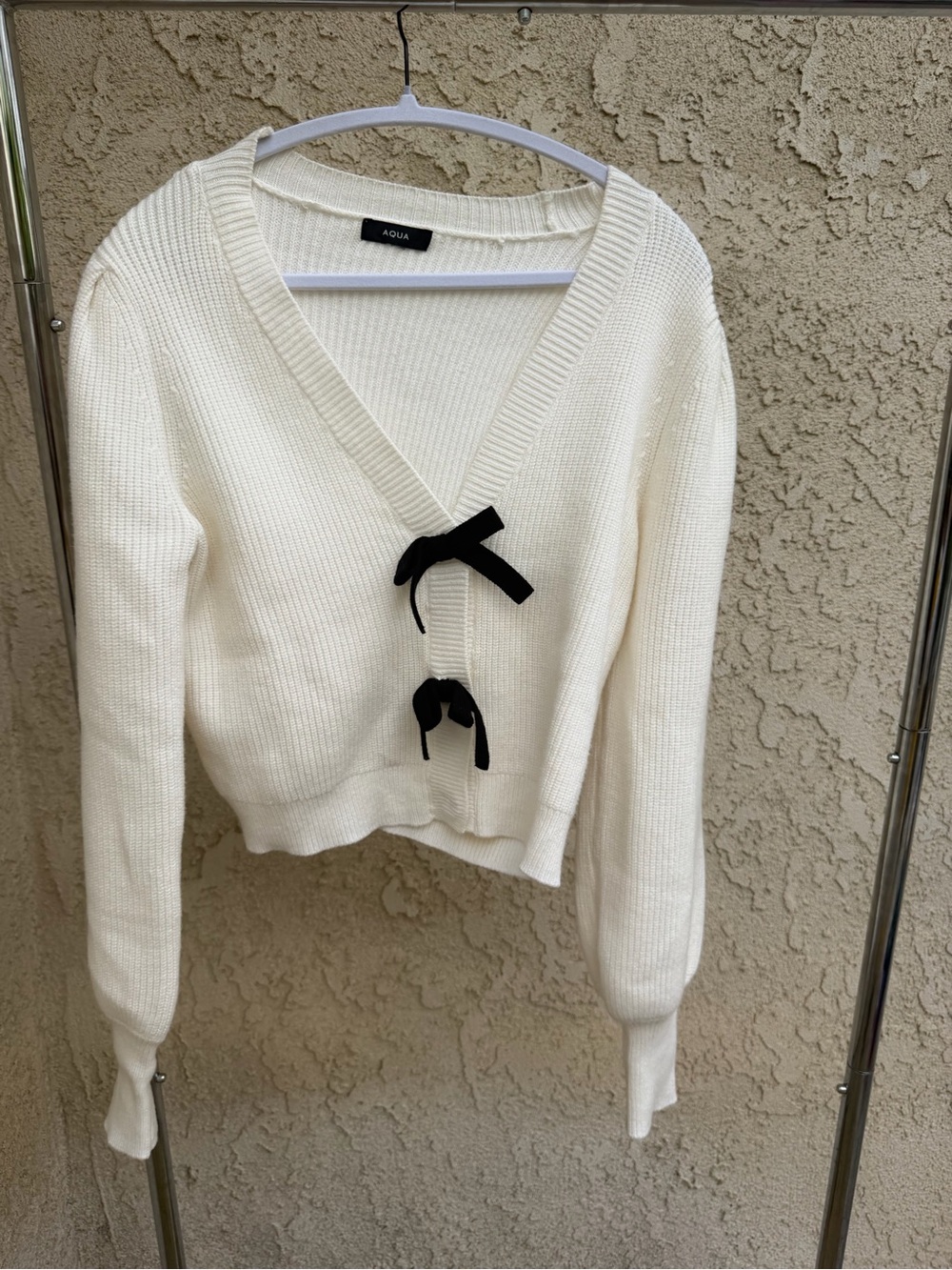 Aqua Cream V-Neck Sweater with Black Bow Accents